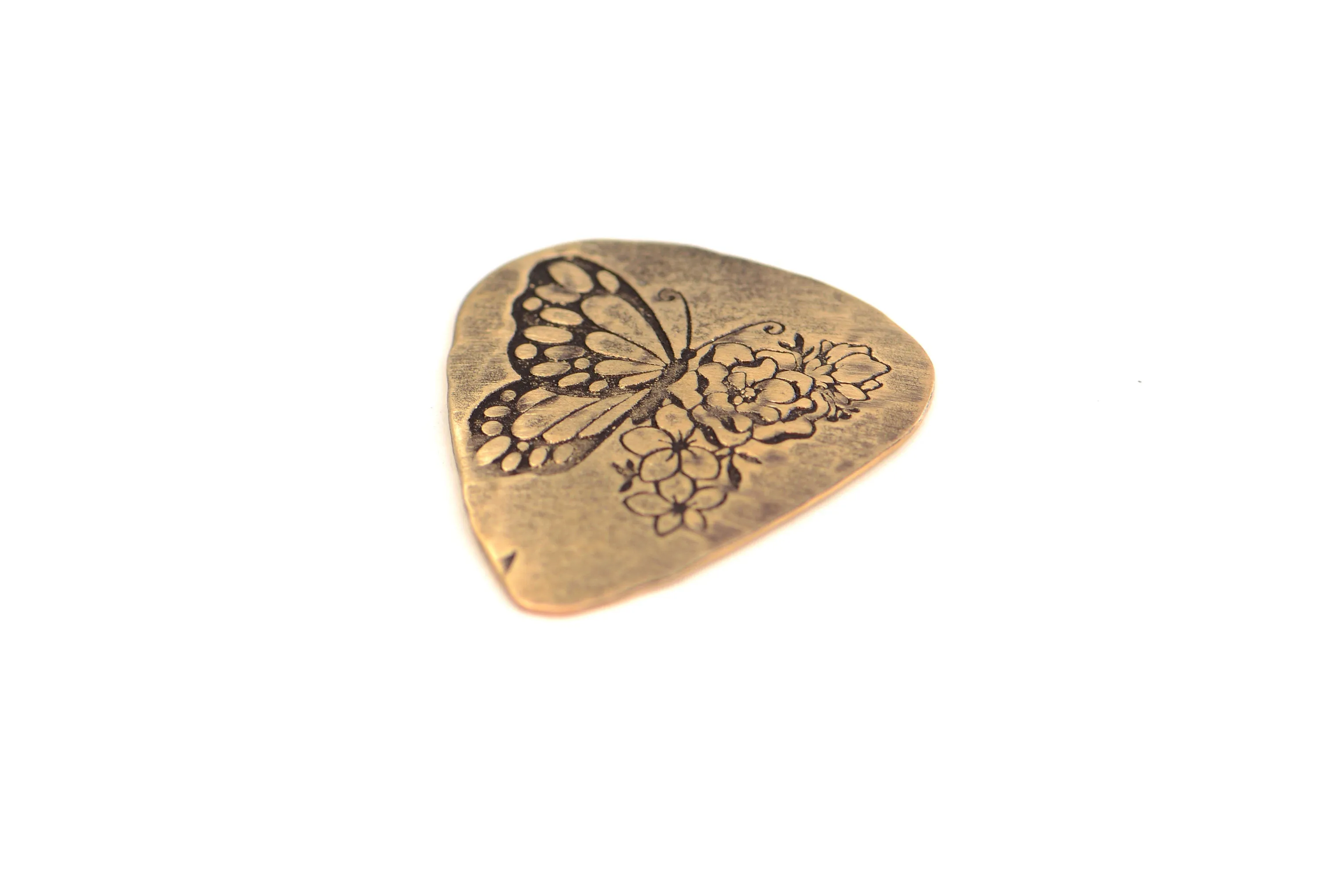 Bronze guitar pick with butterfly and flowers