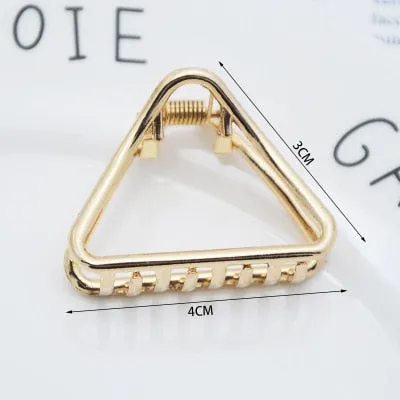 Golden Geometric Hair Claws with a Cute Touch
