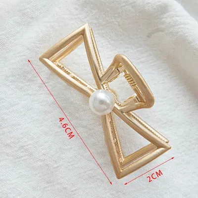 Golden Geometric Hair Claws with a Cute Touch