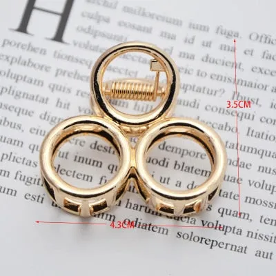 Golden Geometric Hair Claws with a Cute Touch