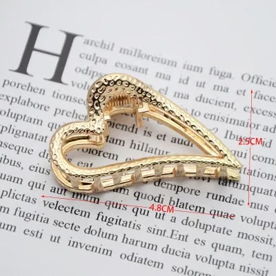 Golden Geometric Hair Claws with a Cute Touch