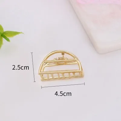 Golden Geometric Hair Claws with a Cute Touch