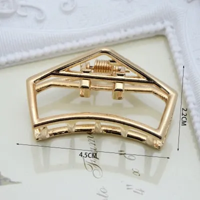 Golden Geometric Hair Claws with a Cute Touch