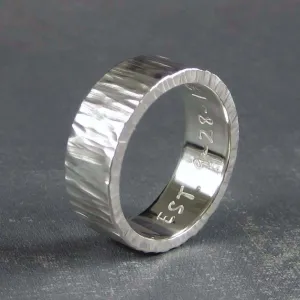 Rustic mens wedding band in carved tree bark pattern
